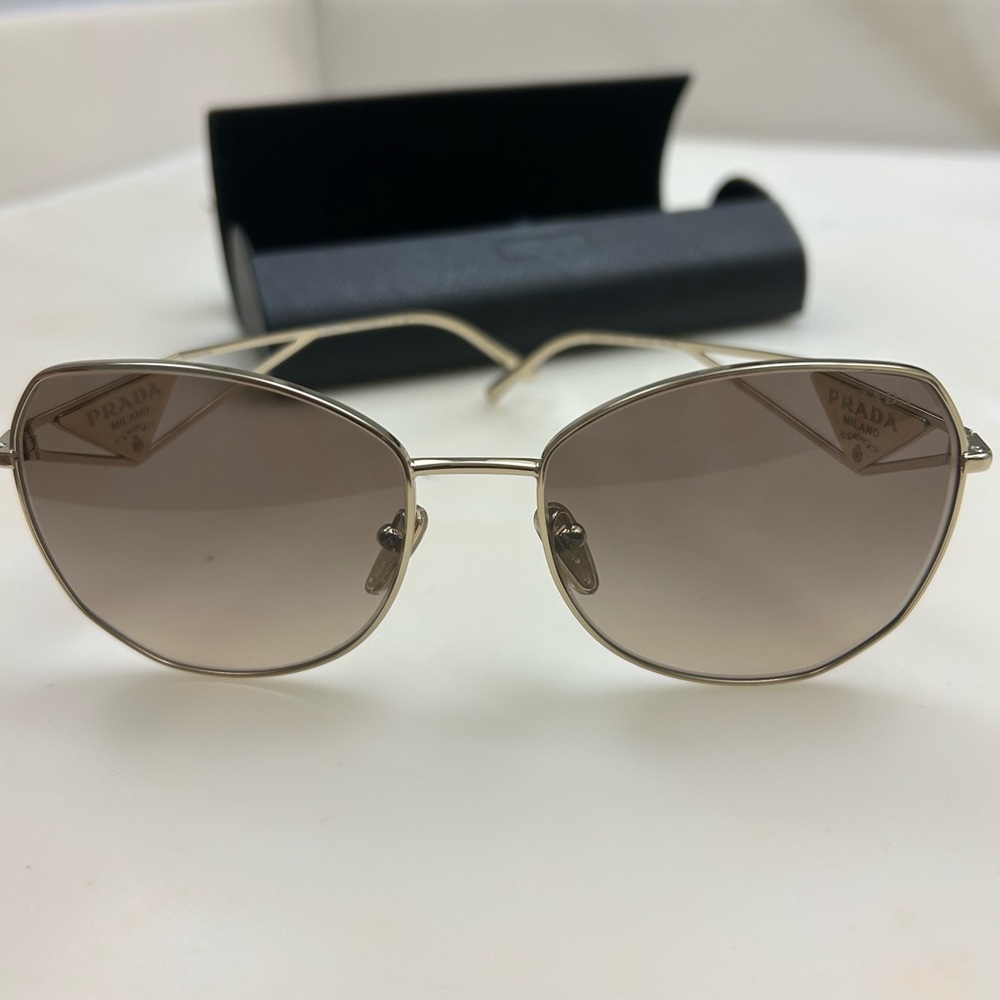 Prada Women's Sunglasses with Gold Frame